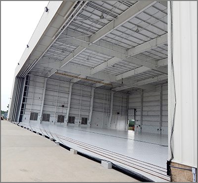 Airport Hanger with door to outside